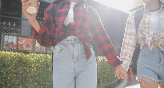 A split image showing a 90s teenager wearing oversized flannel and ripped jeans next to a modern teenager recreating the same outfit, with a side-by-side comparison highlighting the evolving interpretation of 90s grunge fashion.