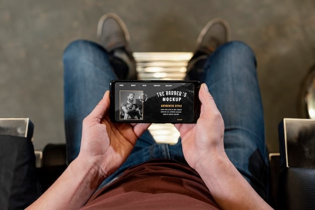 A hand holding a smartphone displaying a movie soundtrack playlist on a music streaming app. The interface shows album art, track titles, and playback controls, illustrating the ease and convenience of accessing music through streaming services.