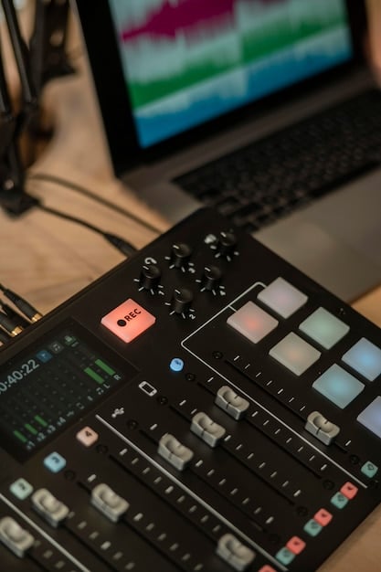 A close-up shot of a budget-friendly audio interface, such as a Focusrite Scarlett Solo or PreSonus AudioBox USB 96. The interface is connected to a laptop and a microphone, highlighting its functionality in a home recording setup. The image focuses on the interface's inputs, outputs, and control knobs.