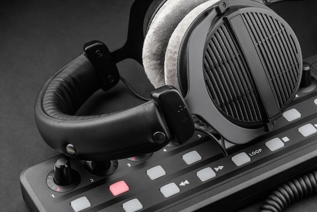 A pair of studio headphones, such as the Beyerdynamic DT 770 Pro or Audio-Technica ATH-M50x, resting on a desk in a home studio. The headphones are positioned to highlight their design and features, such as the comfortable earcups and adjustable headband. The background is blurred to keep the focus on the headphones.