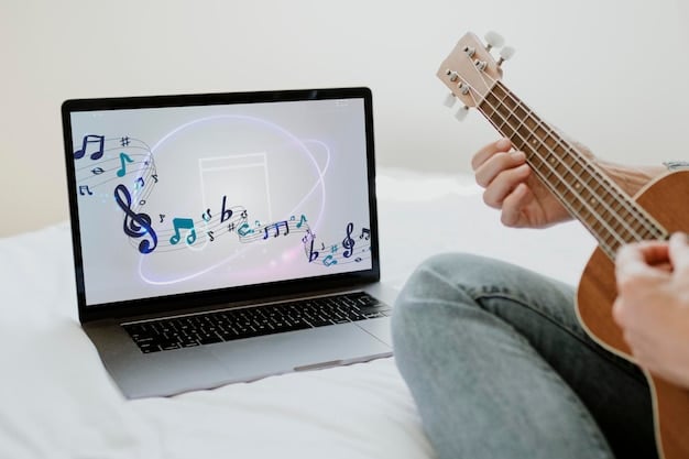 A laptop displaying a musician's website, showcasing their music, tour dates, and contact information, with a clean and professional design.