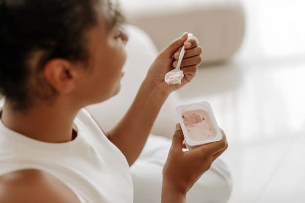A close-up shot of a hand gently applying a shimmering serum to the face. The background is blurred, featuring luxury skincare bottles in soft focus. The lighting emphasizes the serum's texture and the skin's natural glow, conveying a sense of rejuvenation and pampering.